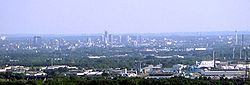 View over the centre of Essen from the "Tetraeder" landmark in Bottrop. In the background the Ruhr Heights.