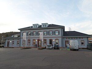 Two-story building with hipped roof