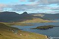 View over the bay of Tjaldavík, Øravík and Trongisvágur. A part of Øravík is visible just below the mountain Oyrnafjall.