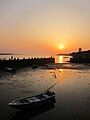 The sunset in front of the Long Pier of Tamsui