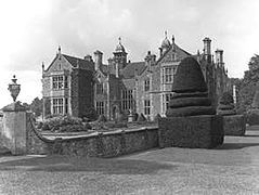 Bradfield House, east front, photographed from NE in 1904, when still occupied by the Walrond family, showing the formal topiary garden