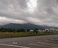 Mount Tampin, Negeri Sembilan, the southern terminus of contiguous Titiwangsa Mountains. Seen from Pulau Sebang, Malacca.