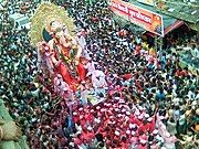 Procession of the famous “Lalbaug cha Raja” Ganesha idol during the Ganesh Chaturthi festival in Mumbai, Maharashtra