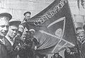 Sailors of the Petropavlovsk in Helsinki, before the Finnish Civil War (Summer 1917); Flag calls for "death to the bourgeoisie", the flag was later used during the Kronstadt uprising and the occupation of Naissaar Island.