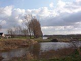 View of the Geniedijk dike, southern border of Vijfhuizen