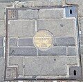 Manhole cover in downtown of Haifa, Israel