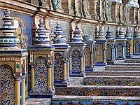 The tiled Provincial Alcoves along the walls of the Plaza de España