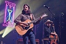 Performing with The Avett Brothers in November 2017