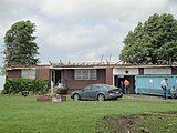 EF2 damage: At this intensity, tornadoes have a more significant impact on well-built structures, removing the roofs, and collapsing some exterior walls of poorly built structures. EF2 tornadoes are capable of destroying mobile homes and generating large amounts of flying debris. This home completely lost its roof, but its walls remained intact. Between 15 and 19% of all annual tornadoes in the U.S. are rated EF2.