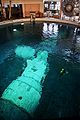 Cosmonauts training with the Zarya training module in the neutral buoyancy pool of the GCTC