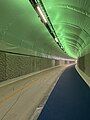 Fyllingsdalstunellen in Norway, a shared-use tunnel (i.e. with a bike lane and footpath; not strictly a cycling tunnel) with a slightly elevated sidewalk