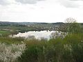 The Schalkenmehrener Maar as seen from Eifelsteig hiking trail