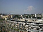 The station from a neighbouring building, with the Piramide station in the background