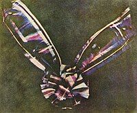 This photograph of a ribbon may be unclear, but it is of high historical importance and very encyclopedic (Promoted November 2006)