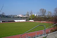 Association football pitch, surrounded by running track