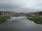 View of the river Besòs as it passes through the municipality. In the later course of the river the "Riverside Park of Besòs" was created and has become an important public open space.