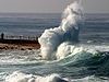 A wave dashing on the seashore