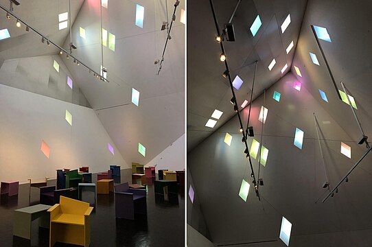 Interior of the "Yud" with windows tinted in various colors for the 2024 exhibition/installation When One Sees a Rainbow by Leah Rosenberg. Photos by Steven Saylor.