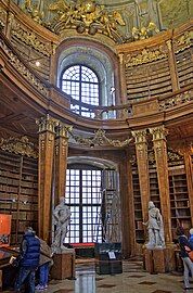 Stylized Baroque Corinthian columns in the Austrian National Library, Hofburg, Vienna, Austria, designed by Johann Bernhard Fischer von Erlach in c.1716–1720, built in 1723–1726[22]