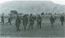 Troops of the 101 Airborne 1d along Route 19 during Operation Highland.