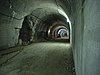 View of a wide lit tunnel stretching into the distance