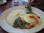 Eggs Sardou with grits and shrimp