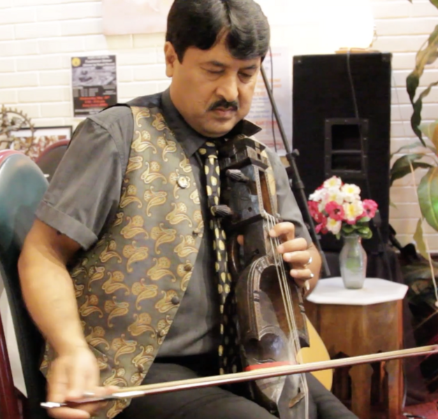 File:Mahat playing sarangi.png