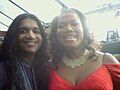 Anand Bhatt (left) and Queen Latifah (right) on the GRAMMY Red Carpet