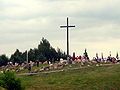 Site of the monument to the victims of Augustów chase in Giby (Podlaskie Voivodeship). Memorial procession visible in the background.