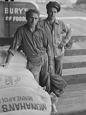 Two men loaded flour