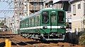 Two-car set 8568 in green and white livery in February 2017