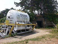 EDALHAB, an underwater habitat used for saturation diving experiments in Lake Winnipesaukee in the late 1960s, now located outside the Seacoast Science Center.[15][16][17] Battery 204, a former 6-inch gun battery, is in the background.