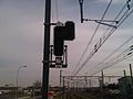 Signal near Vernier-Meyrin station. This is a French Carré signal built by Integra to the French system. Note the Swiss style octagonal backplate.