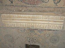 Marble inscription inserted in a mosaic