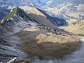 View from the summit to the plateau below with a small nameless lake