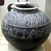 Black-glazed earthenware vessel with swastika image discovered in Shamkir fortress, Azerbaijan History Museum