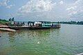 A loaded pontoon (goods, cars and people) at Oguta Lake