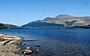 View across Loch Lomond at the waterline looking North at Ben Lomond