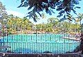 General view of pool through entrance railings