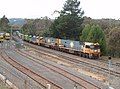 Pacific National freight train passing through Belair