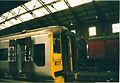 A Wessex Train in Bristol Temple Meads station with Post Office wagons in the background during 2001.