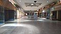 The mall's concourse at night on May 7, 2021, looking towards the JCPenney court and Furniture Outlet (Former Sears)