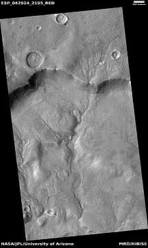 Channel system that travels through part of a crater, as seen by HiRISE under HiWish program