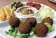 A variety of foods on a sectioned plate