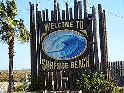 The entrance sign to Surfside Beach