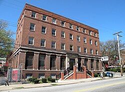 A four-story red brick building