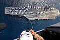 Image 34United States Navy personnel engage in Special Patrol Insertion/Extraction (SPIE) training between a Sikorsky SH-60 Seahawk helicopter and the USS Dwight D. Eisenhower (CVN-69). SPIE involves either a person or goods being lowered from or raised to a helicopter via a cable above terrain on which landing would be difficult.