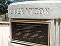 Liberation plaque – base of memorial