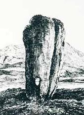 A black and white line drawing of a tall standing stone that is wider at the top than the base. It has a long vertical crack on the right-hand side and there is a small hole that goes right through it near the ground. A lake and hill are in the background.