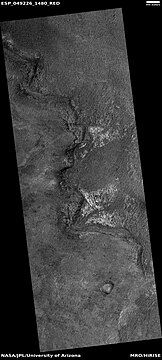 Light-toned material, as seen by HiRISE under HiWish program. Light-toned material is often associated with minerals that formed in water.